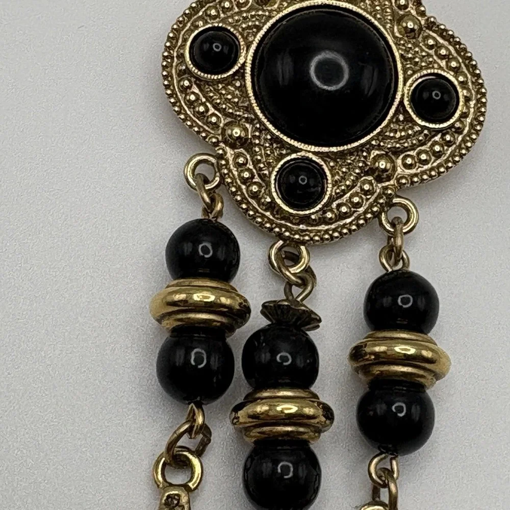 Vintage 1928 Brooch Etruscan Revival Shield Dangle Tassel Gold Black